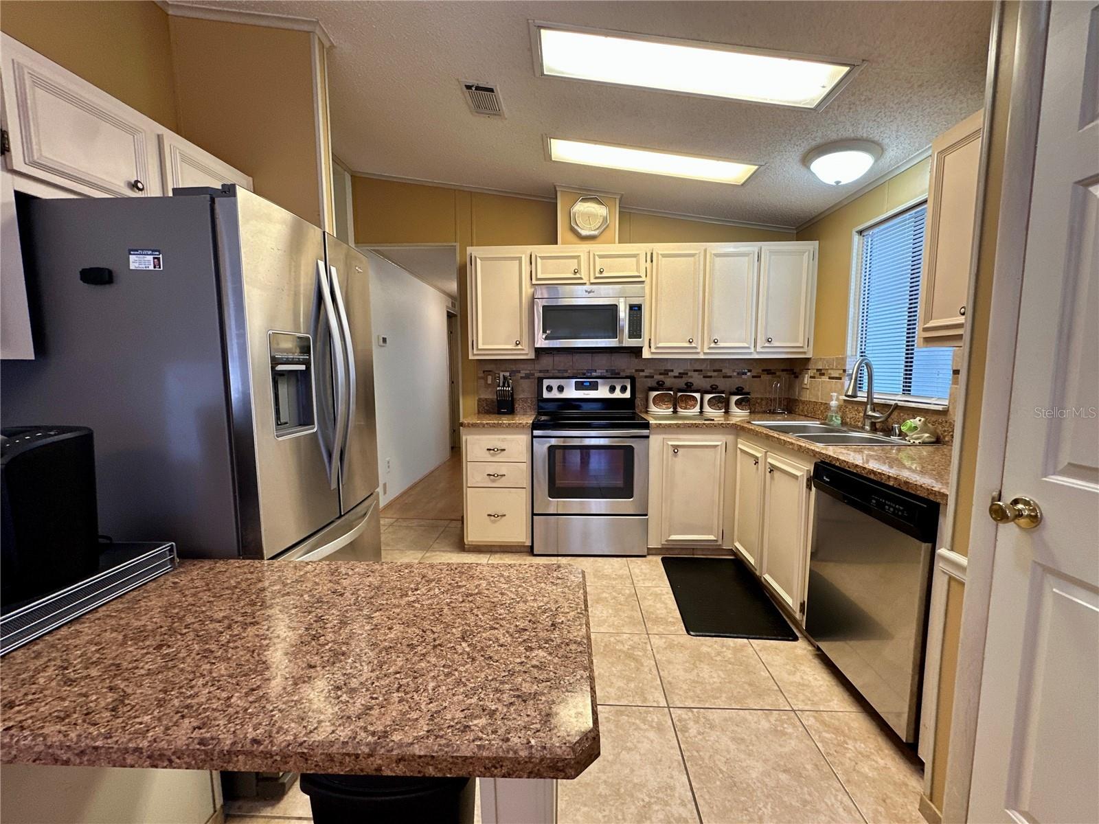 1704 LILLY LN, THE VILLAGES, FL — photo 12