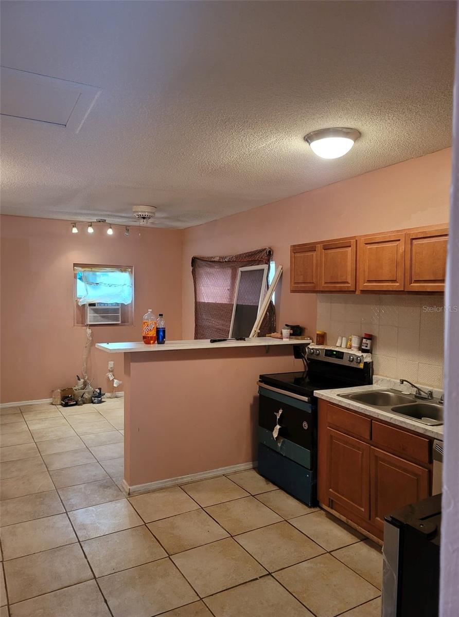 107 E CYPRESS ST, KISSIMMEE, FL — photo 11