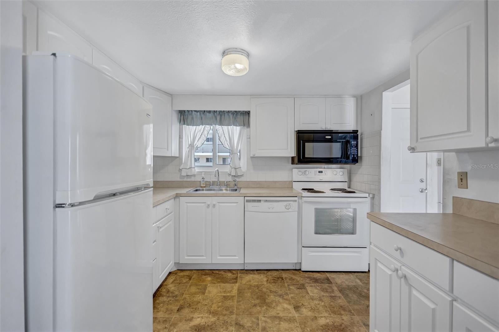 2217 SUNSET DR #E27, BRADENTON, FL — photo 10
