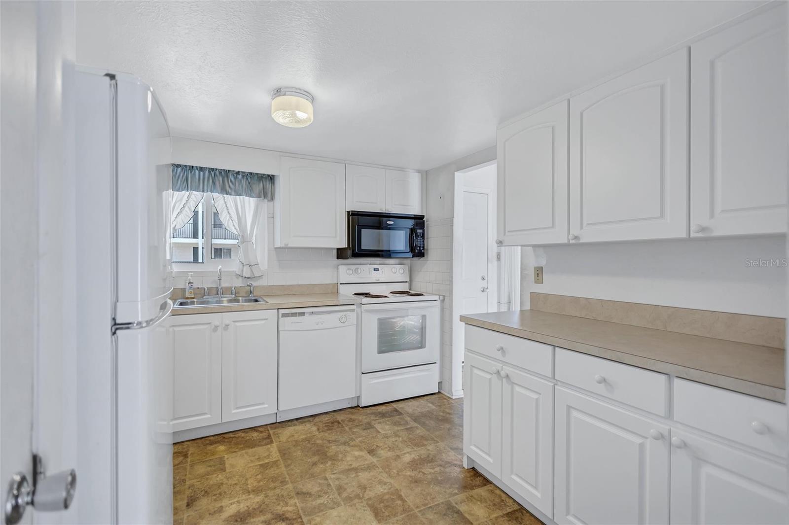2217 SUNSET DR #E27, BRADENTON, FL — photo 11