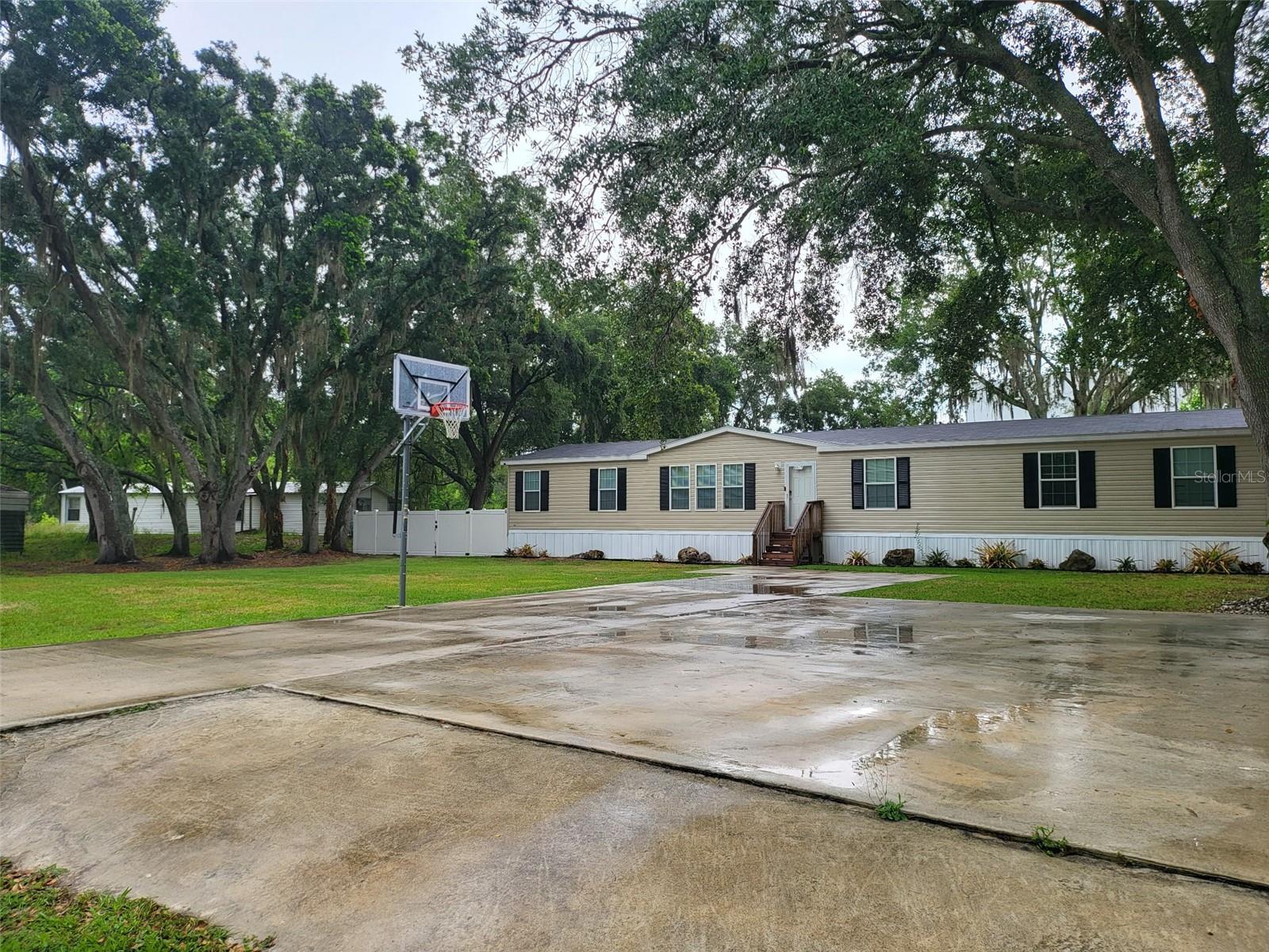 8915 HAMMOCK LOOP, POLK CITY, FL 33868, POLK CITY, FL — photo 2