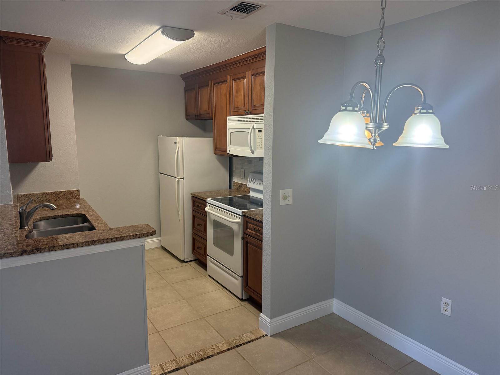 8932 MANOR LOOP #205, LAKEWOOD RANCH, FL — photo 13