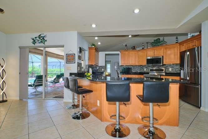844 NE 6TH AVE, CAPE CORAL, FL — photo 24