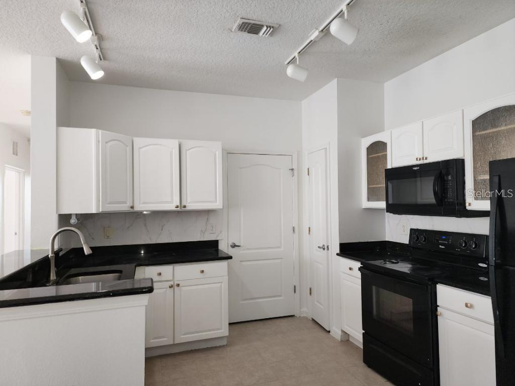 5255 CANE ISLAND LOOP #304, KISSIMMEE, FL — photo 10