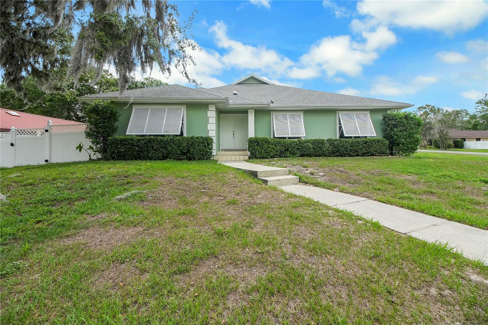 317 WOODLAND TRL, LADY LAKE, FL — photo 13