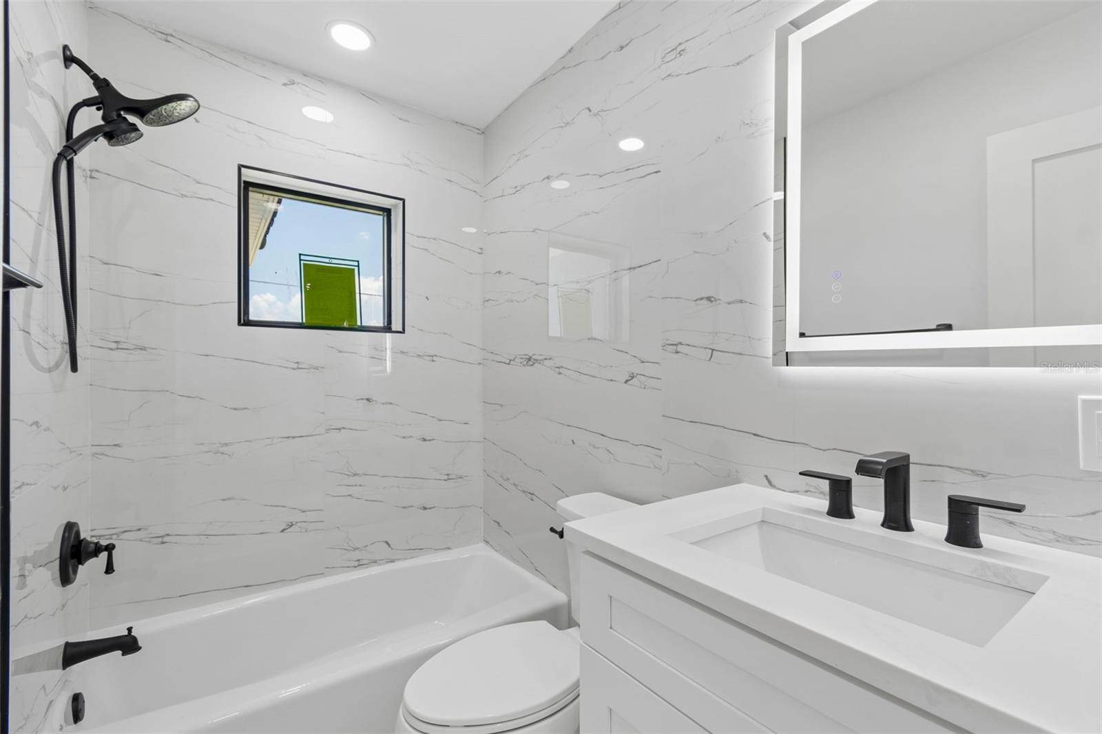 10238 TARPON DR, TREASURE ISLAND, FL — photo 38