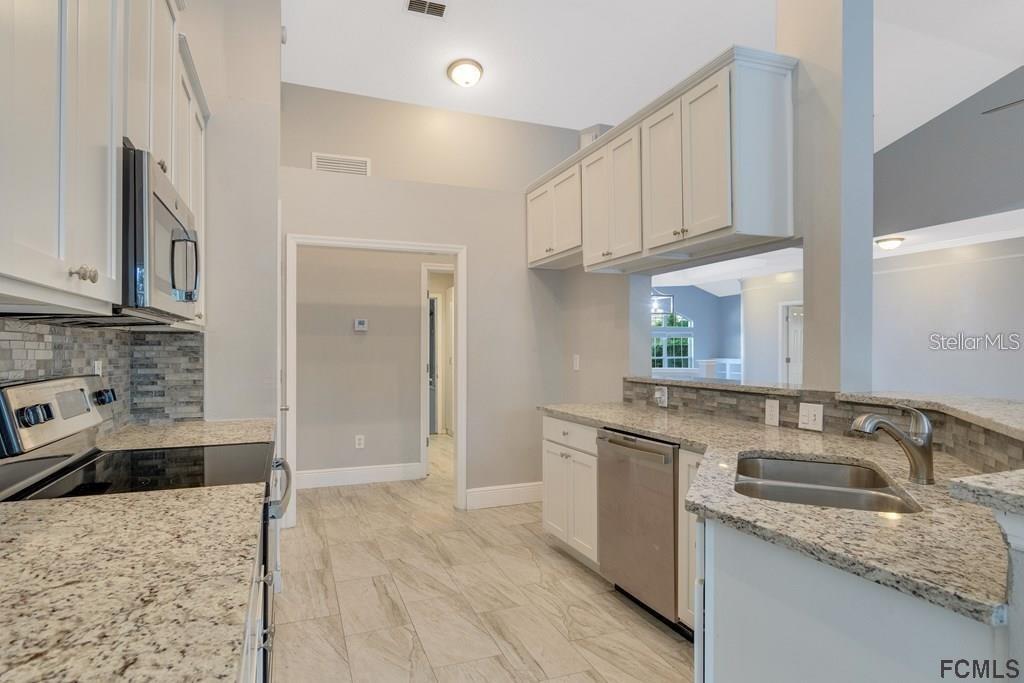 7 SHINNECOCK CT, PALM COAST, FL — photo 17