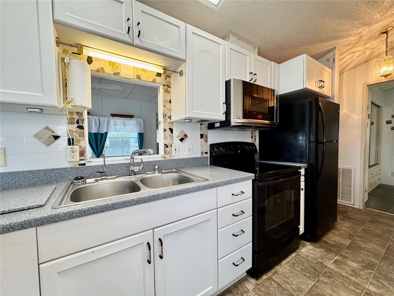 35151 DANNY DR #Lot 114, ZEPHYRHILLS, FL — photo 14