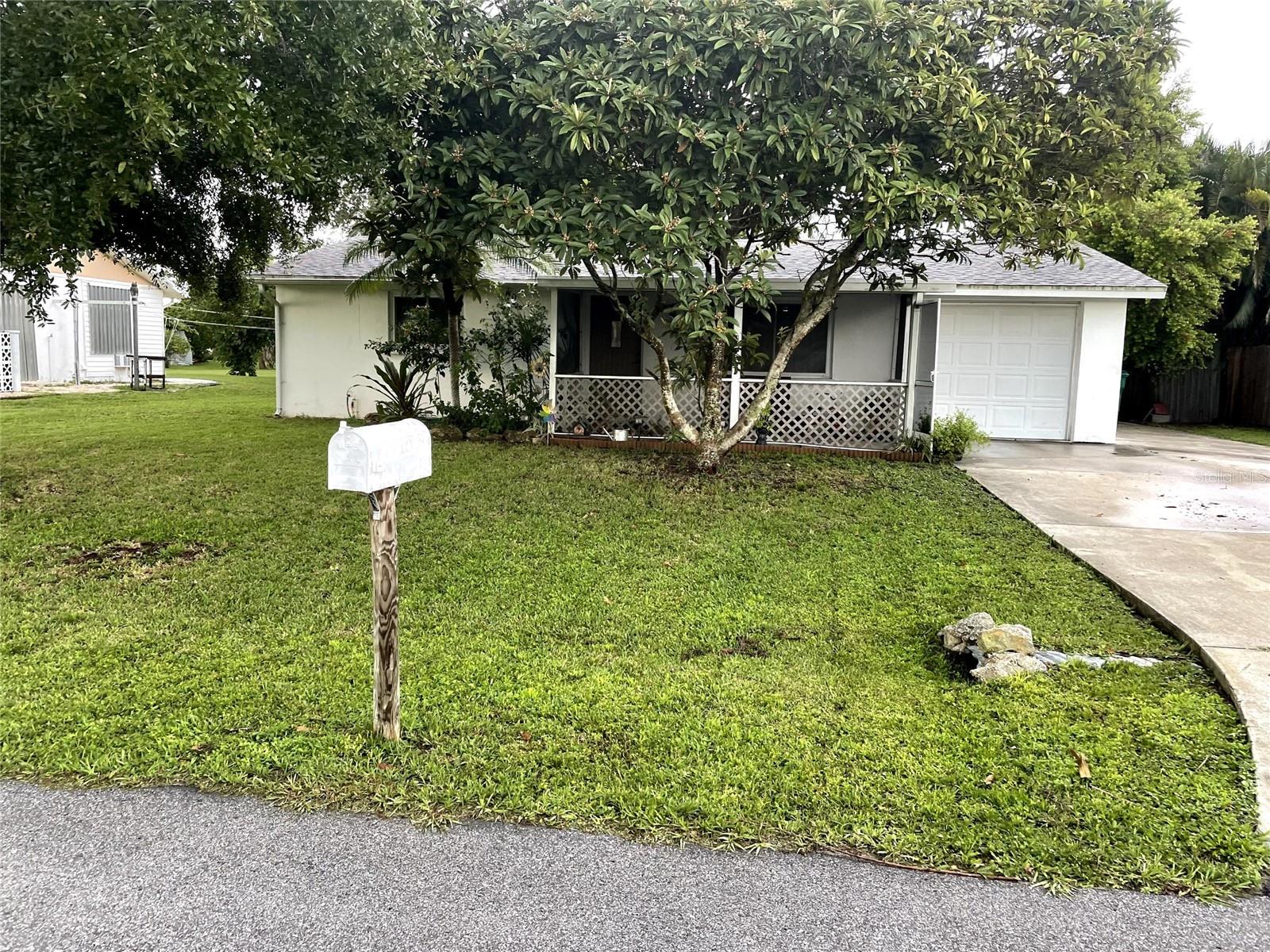 210 WALNUT AVE NW, PORT CHARLOTTE, FL