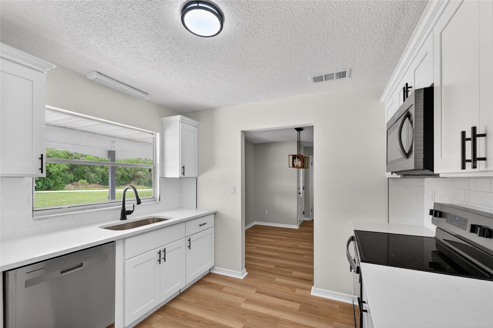 12071 DEEP CREEK DR, SPRING HILL, FL — photo 4