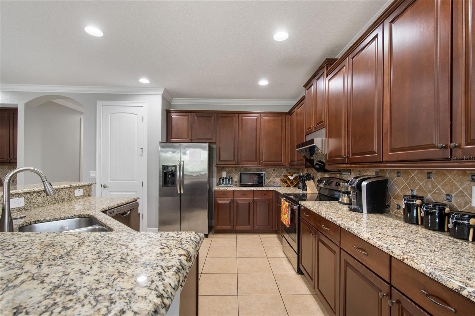 945 DESERT MOUNTAIN CT, REUNION, FL — photo 27