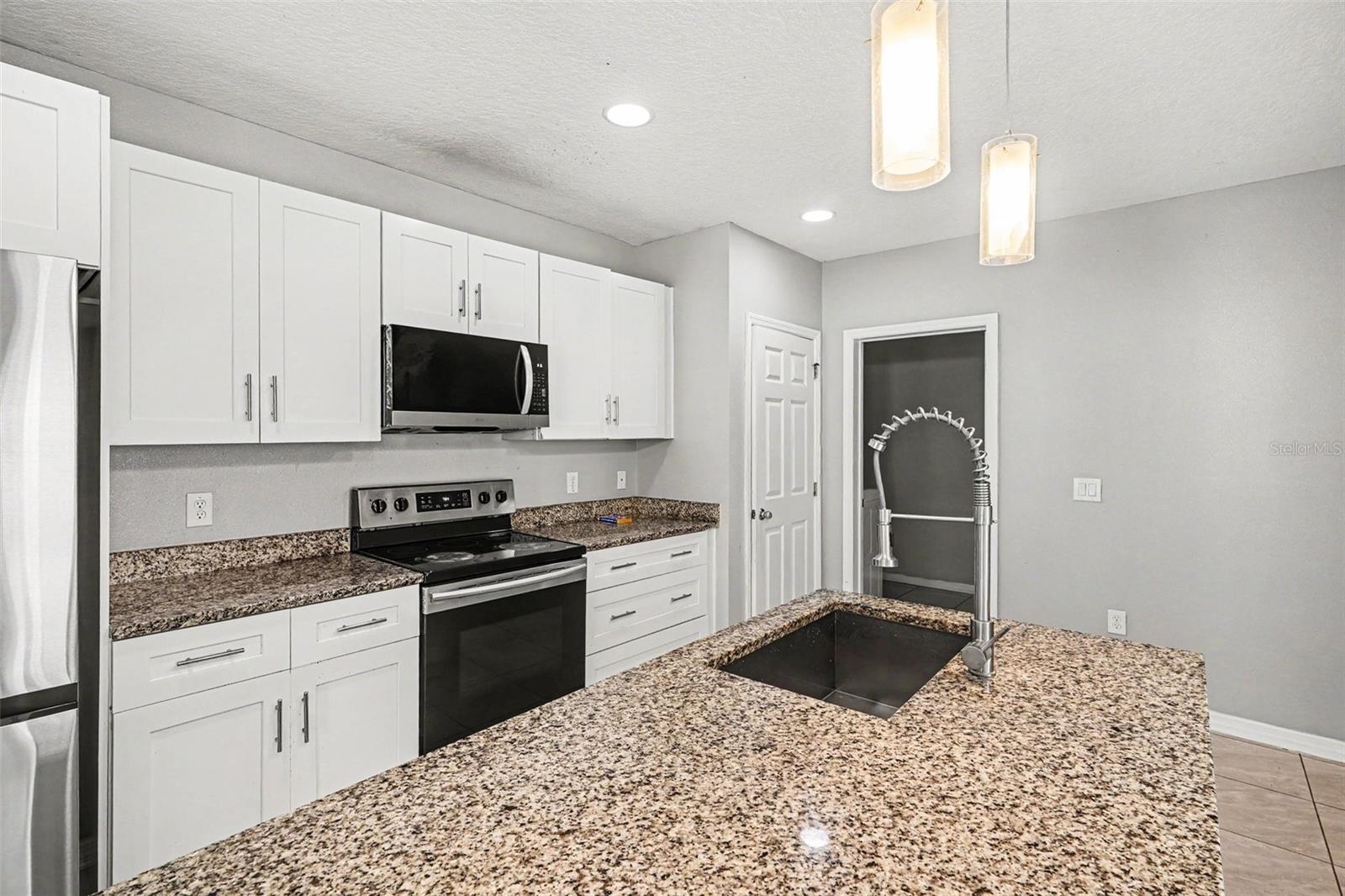 4957 CASTLE ST E, KISSIMMEE, FL — photo 10