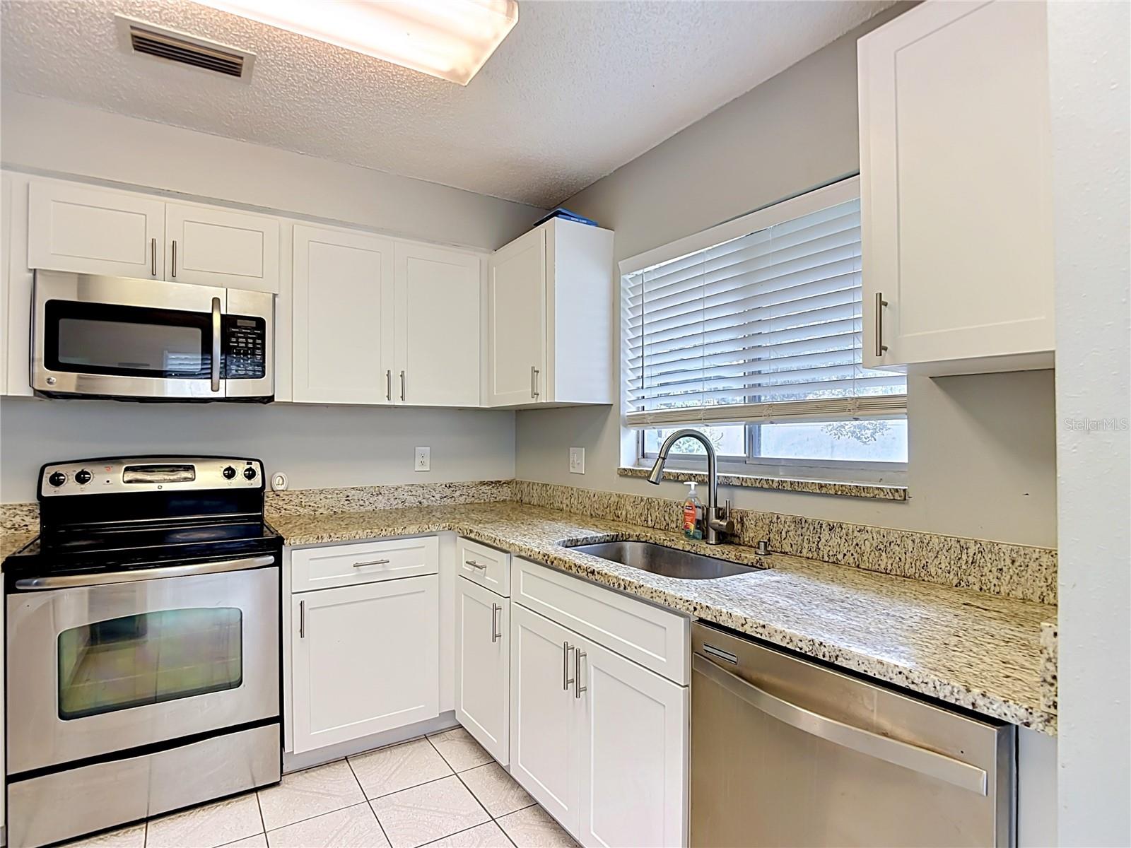 7110 HOLLOWELL DR, TAMPA, FL — photo 18