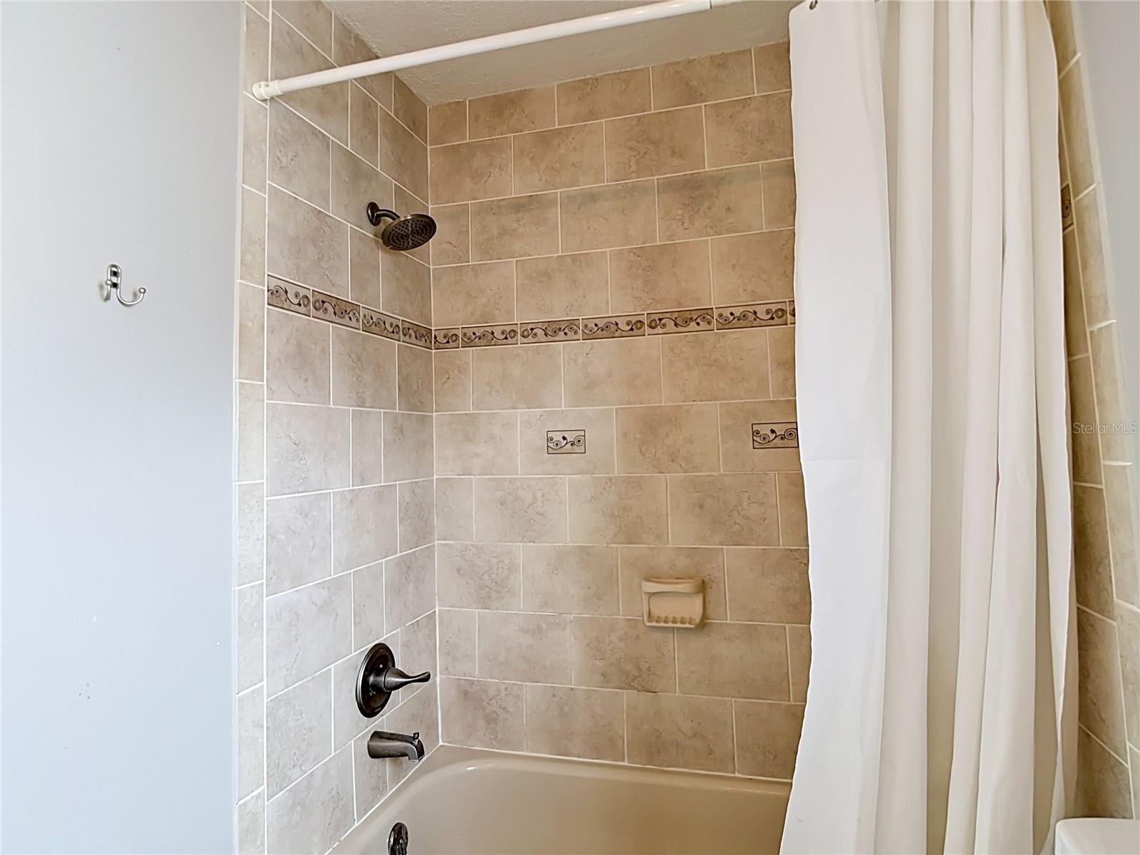 7110 HOLLOWELL DR, TAMPA, FL — photo 23