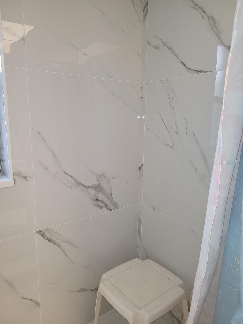 255 CAPRI CIR N #17, TREASURE ISLAND, FL — photo 32