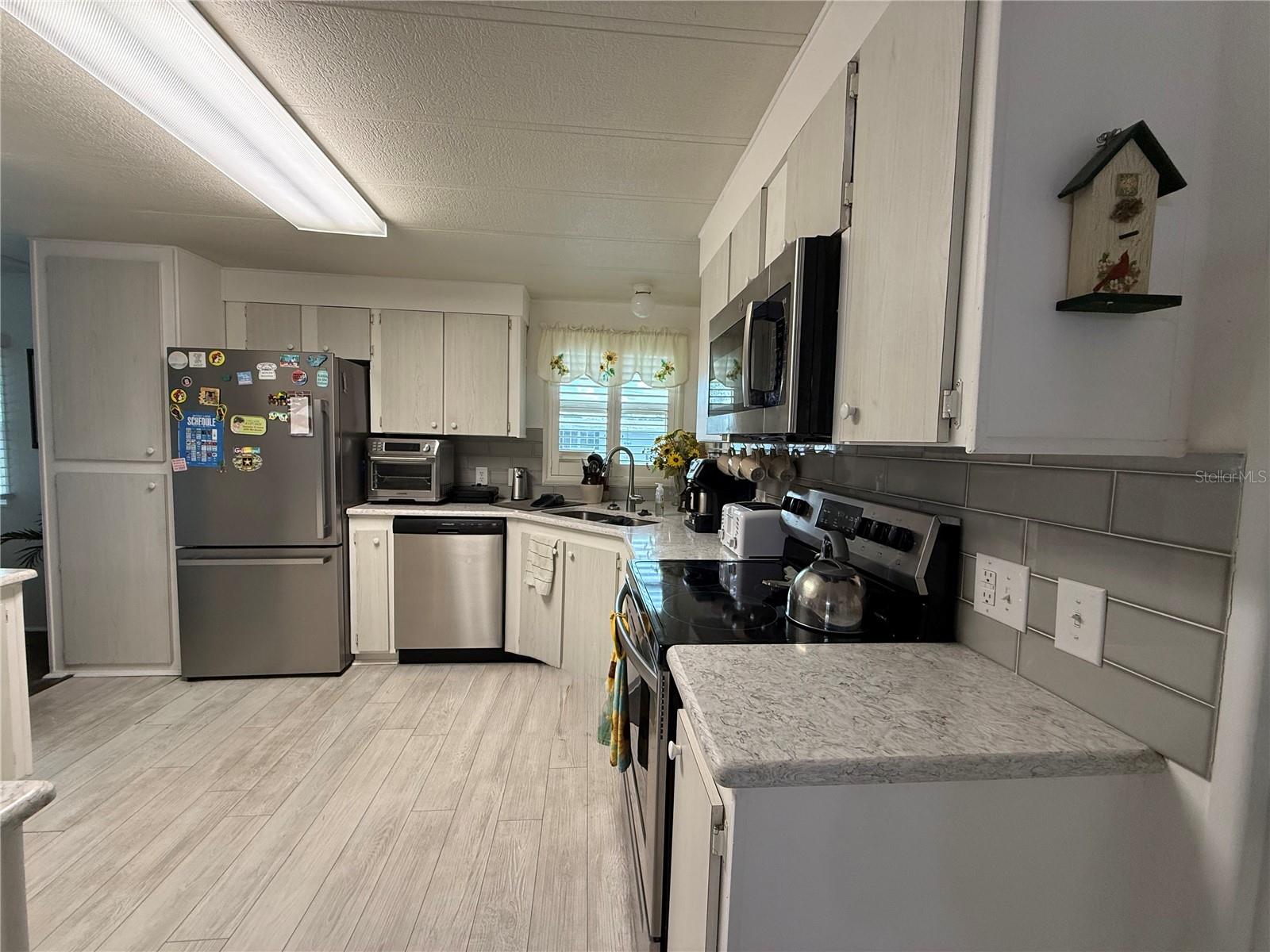 21 S BOBWHITE RD, WILDWOOD, FL — photo 3