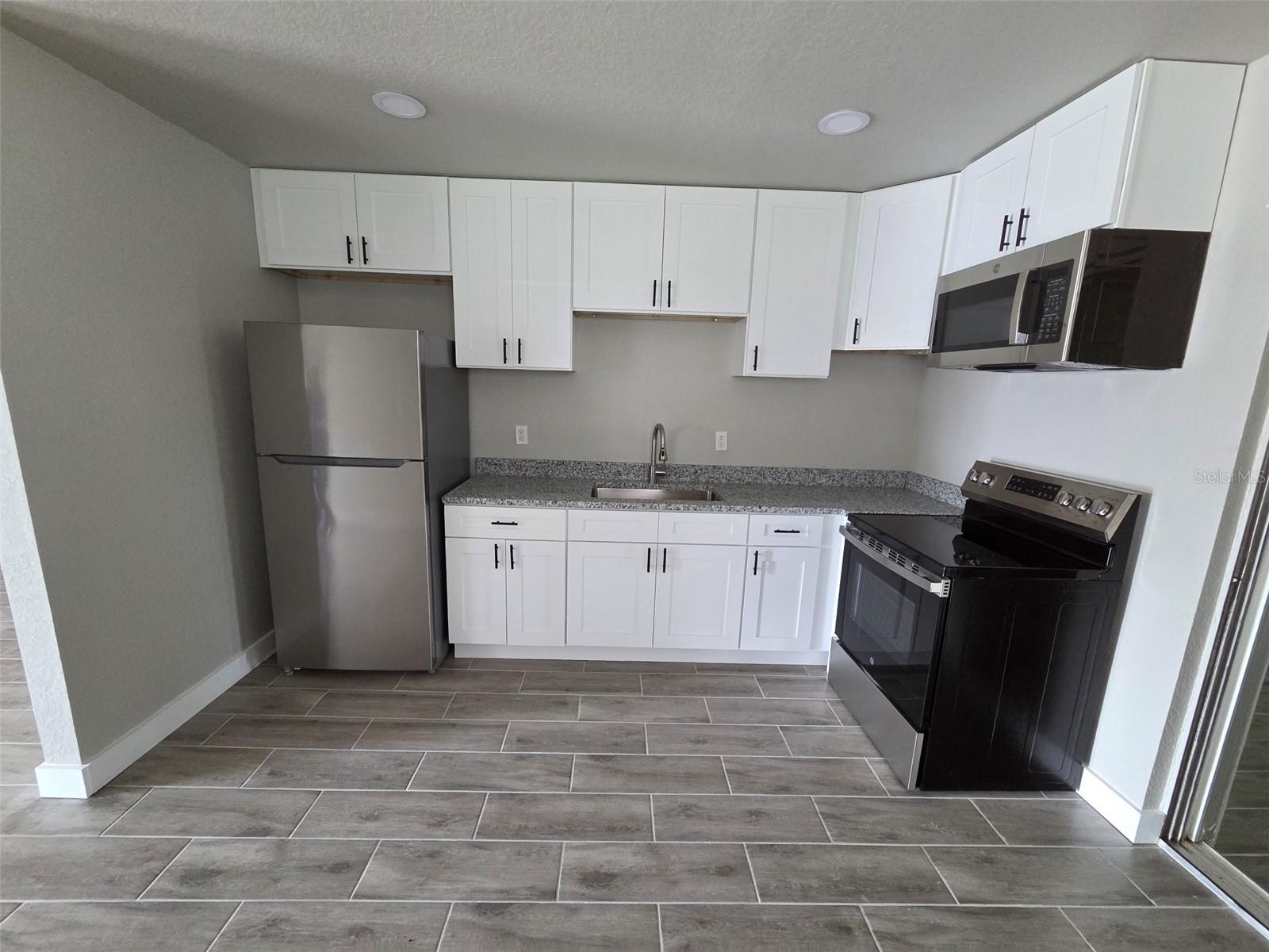 38300 HENRY DR, ZEPHYRHILLS, FL — photo 8
