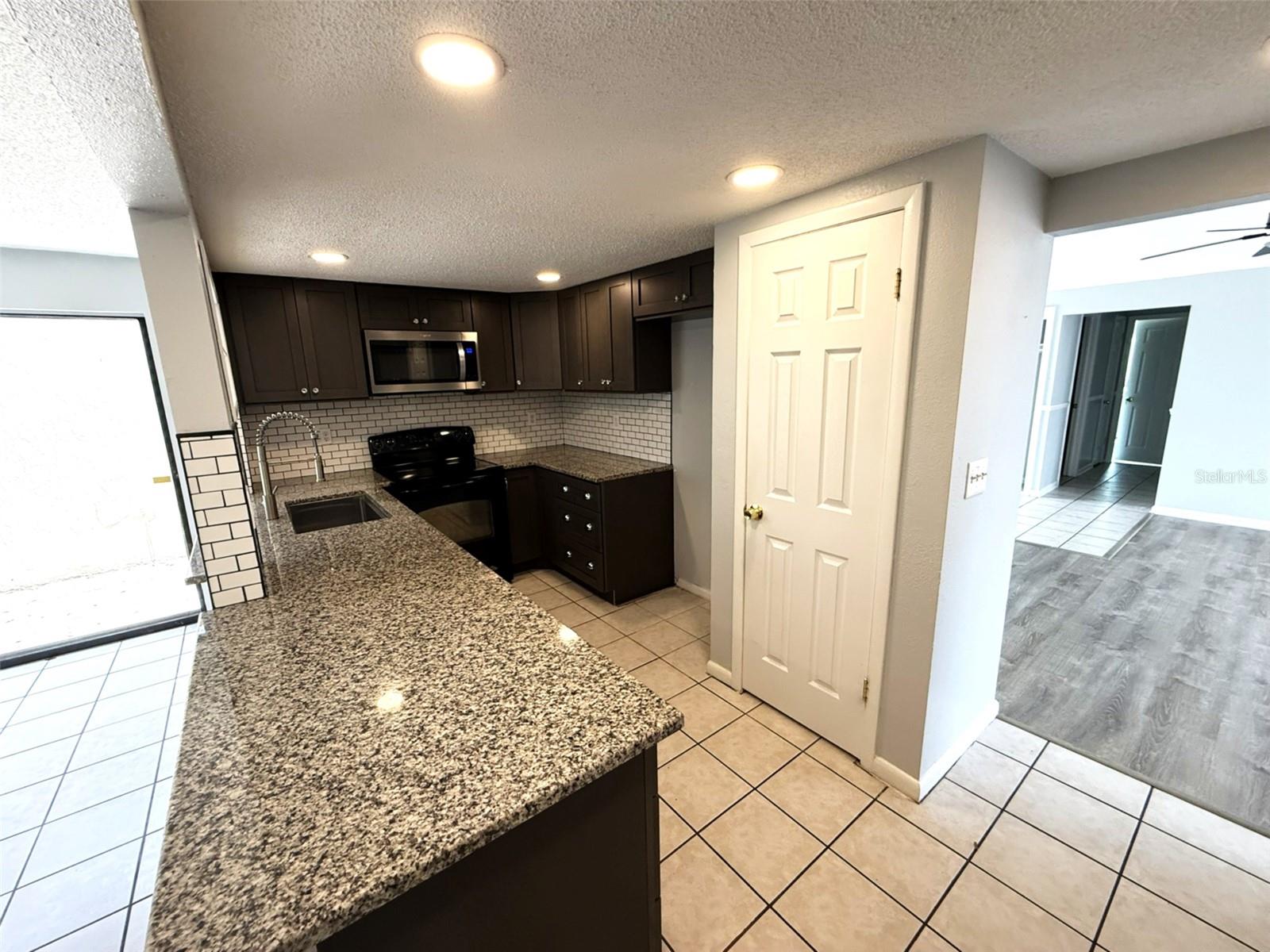 12905 SETTLERS DR, HUDSON, FL — photo 9