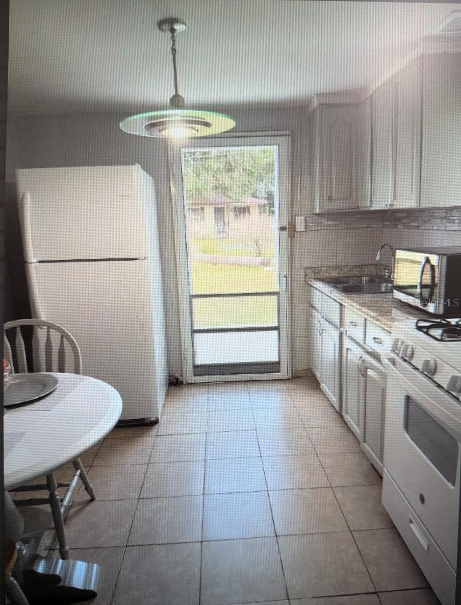 2725 SAMPLE ST, KISSIMMEE, FL — photo 4