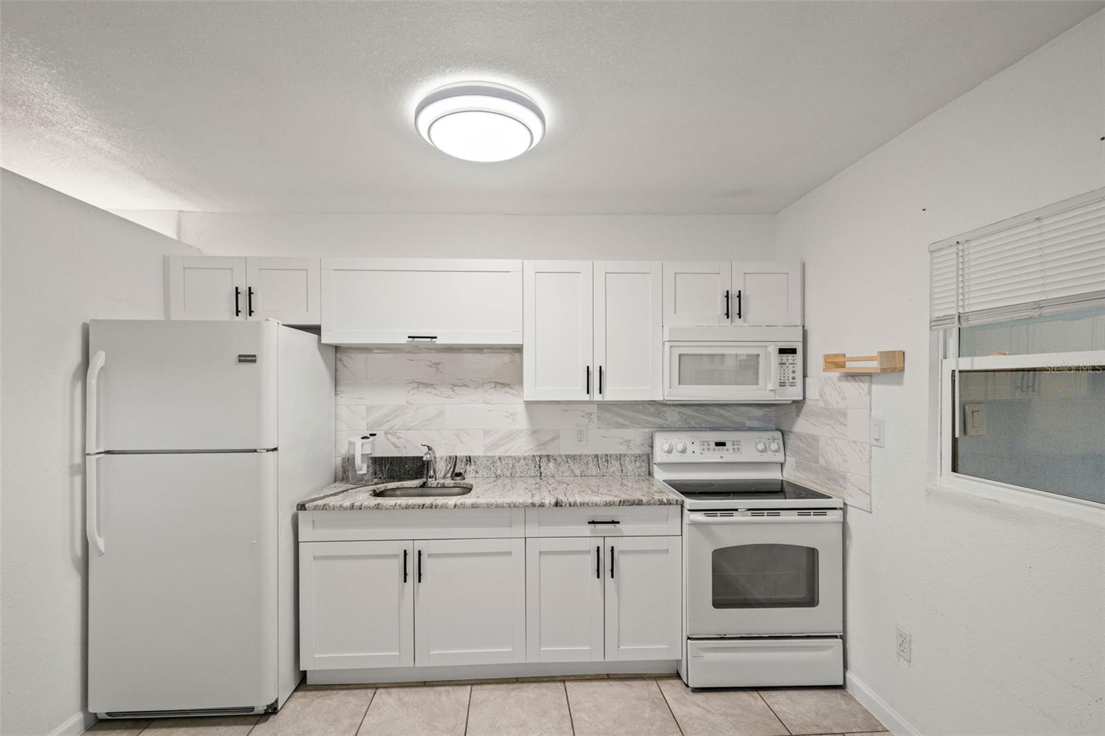 102 W NORTH ST, TAMPA, FL — photo 37
