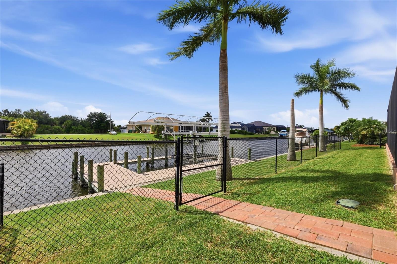 9404 SPRING CIR, PORT CHARLOTTE, FL — photo 35