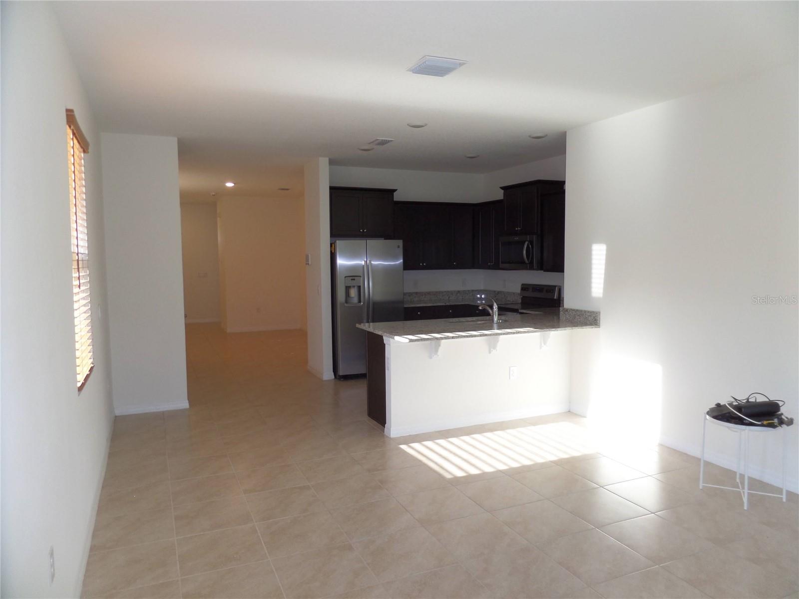 8051 PENROSE PL, WILDWOOD, FL — photo 13