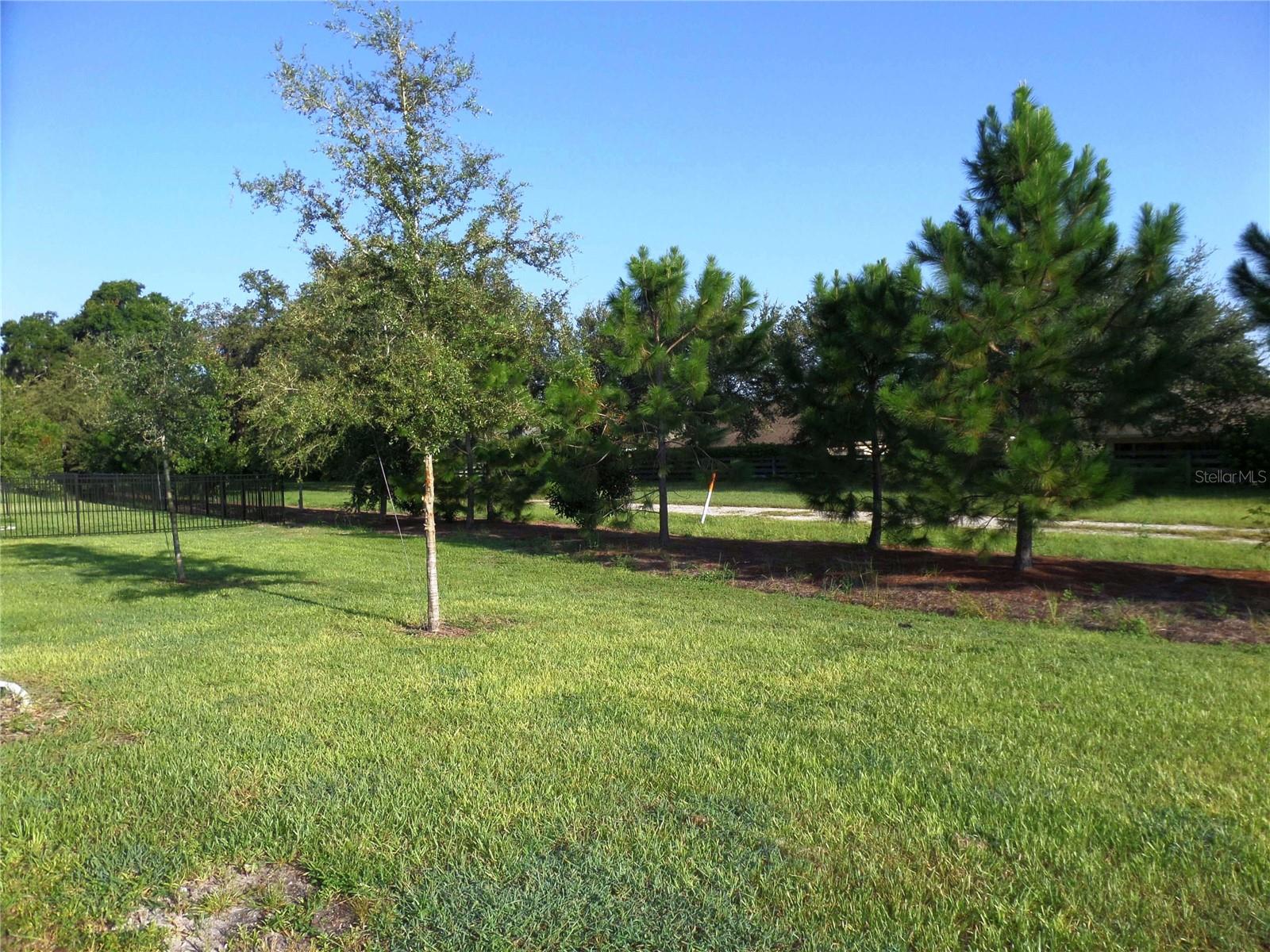 8051 PENROSE PL, WILDWOOD, FL — photo 22