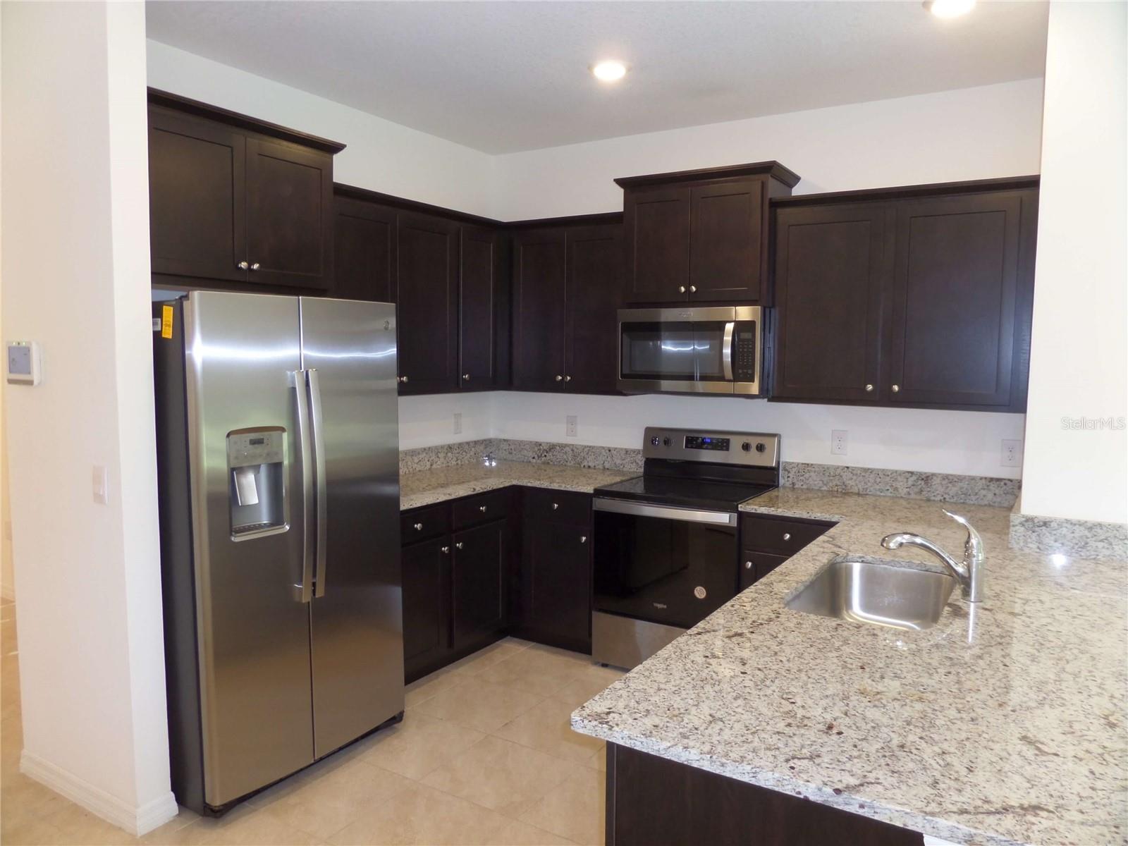 8051 PENROSE PL, WILDWOOD, FL — photo 36