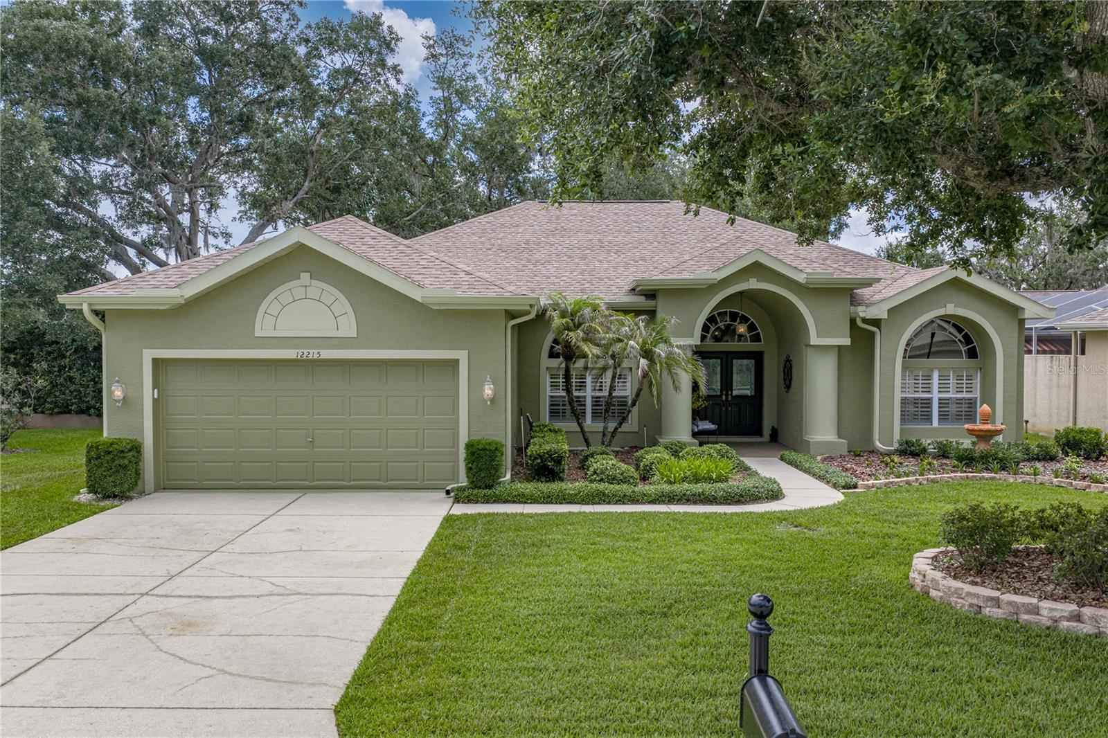 12215 WOODLANDS CIR, DADE CITY, FL — photo 6