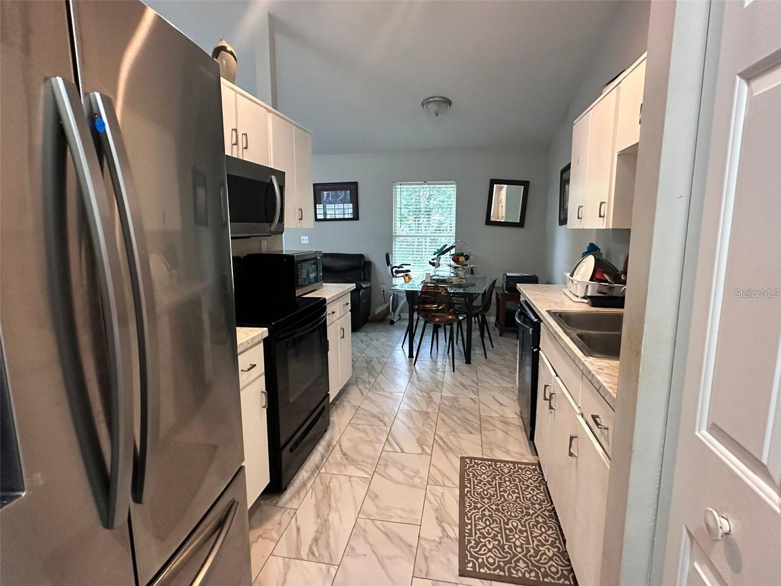 1021 EMBRUN CT, KISSIMMEE, FL — photo 2