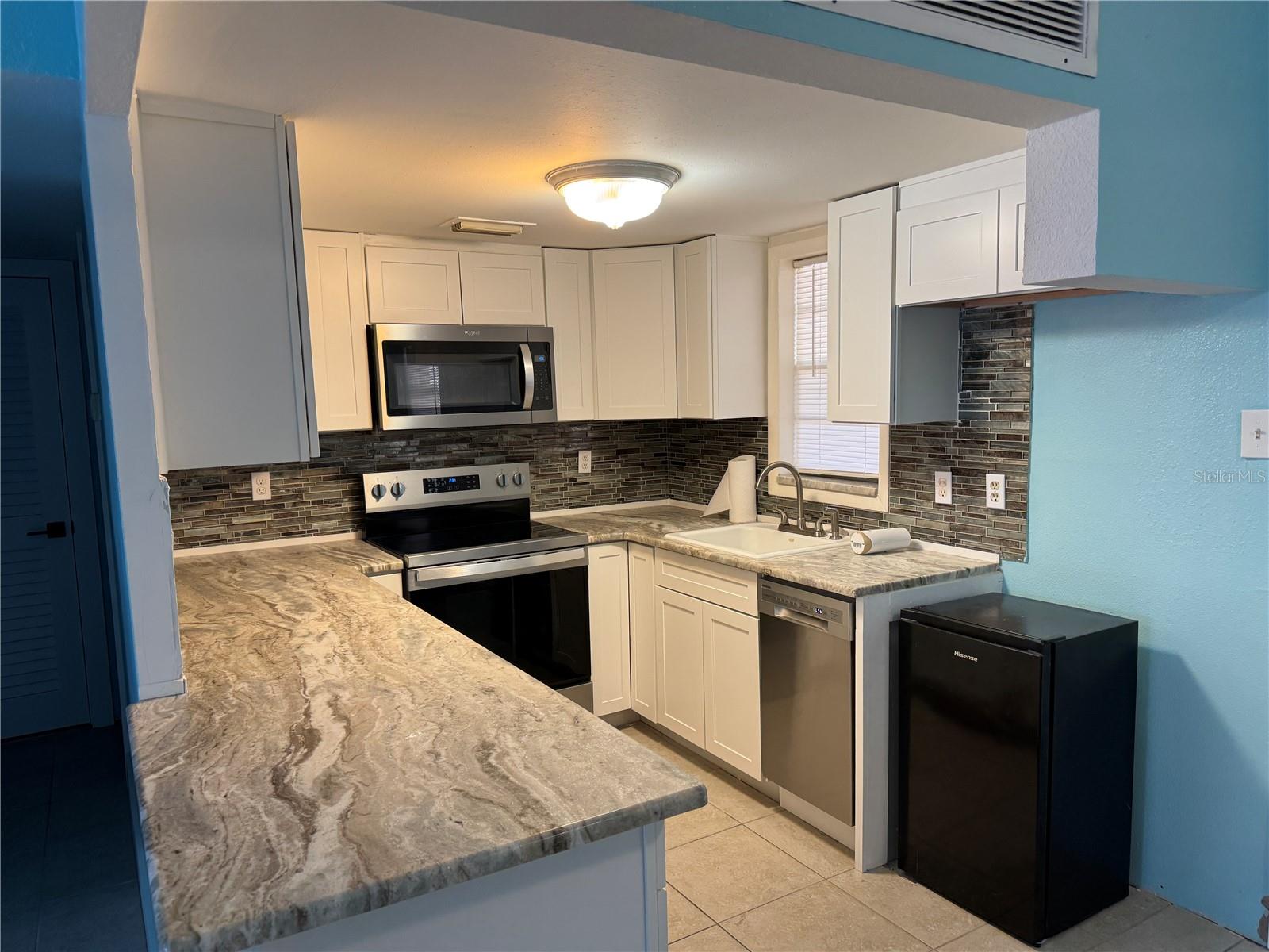4515` MARINE PKWY #102, NEW PORT RICHEY, FL — photo 3
