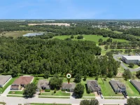 5546 WINDSONG OAK DR — photo 35