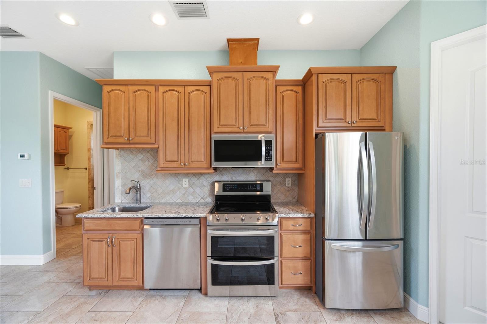 3210 GREAT HERON LOOP, POLK CITY, FL — photo 11