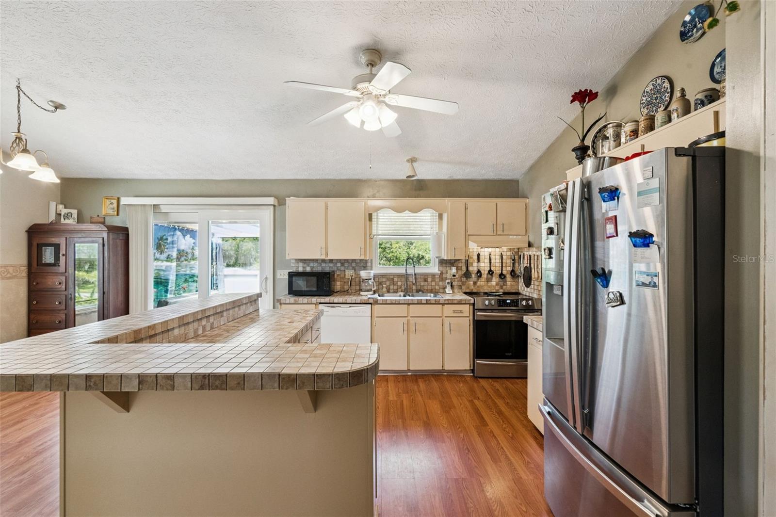 1869 KINGS POINT BLVD, KISSIMMEE, FL — photo 12