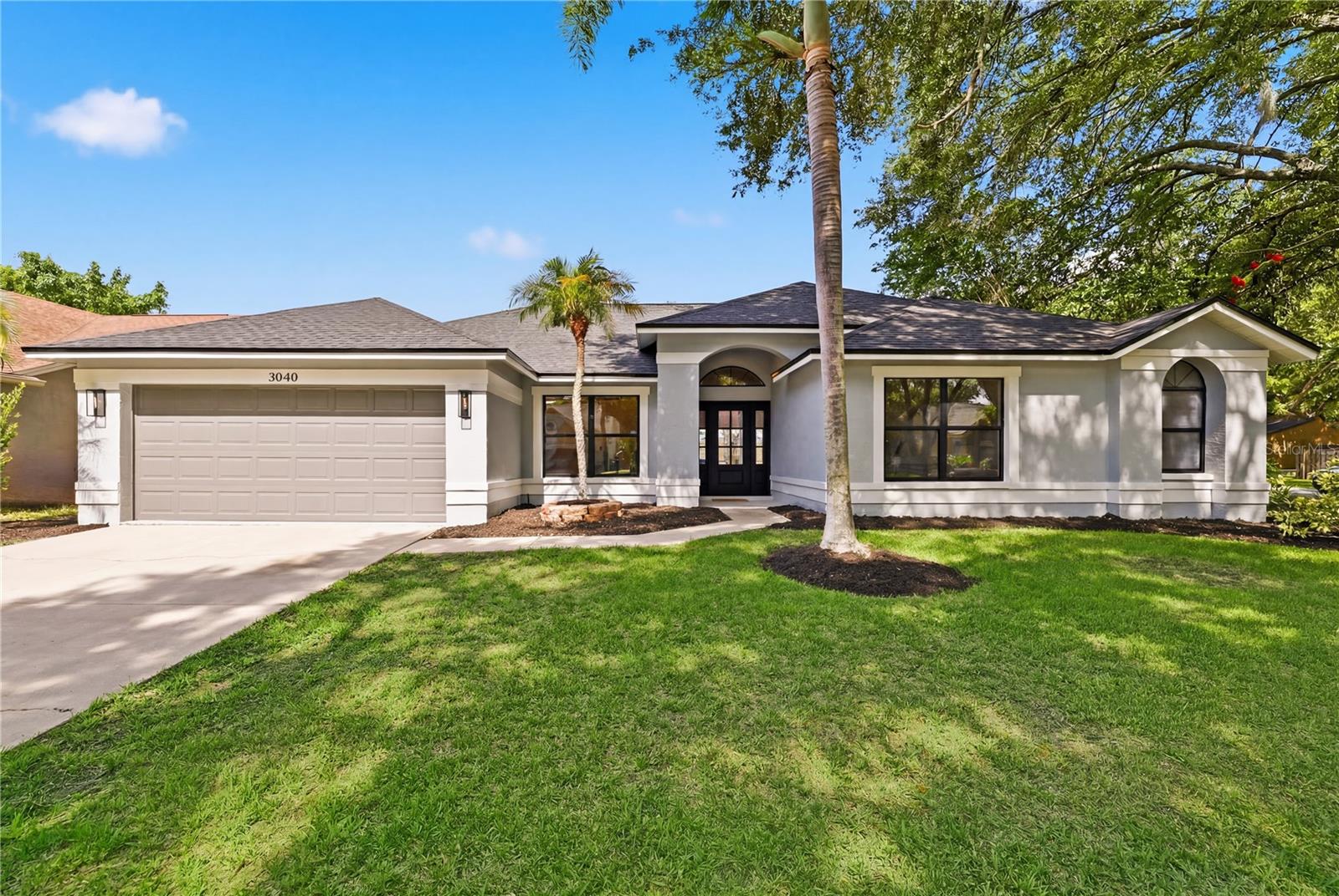 3040 WINDRIDGE OAKS DR, PALM HARBOR, FL — photo 2