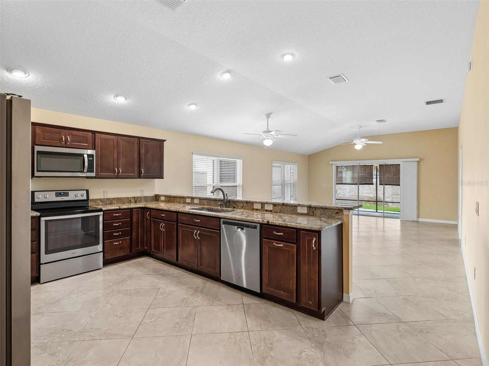 2877 FEUSTEL AVE, THE VILLAGES, FL — photo 9