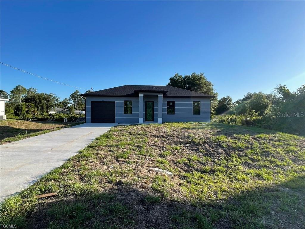 707 LEDGE ST, LEHIGH ACRES, FL — photo 2
