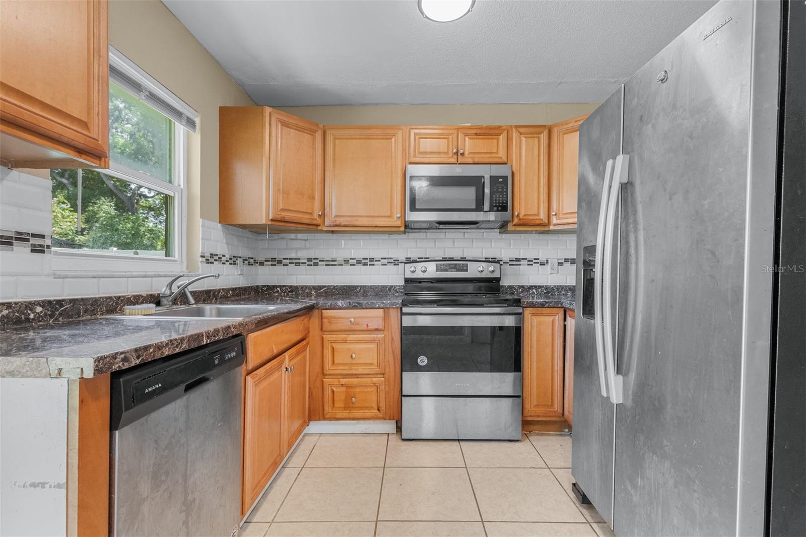 911 W GASTON PL, TAMPA, FL — photo 11