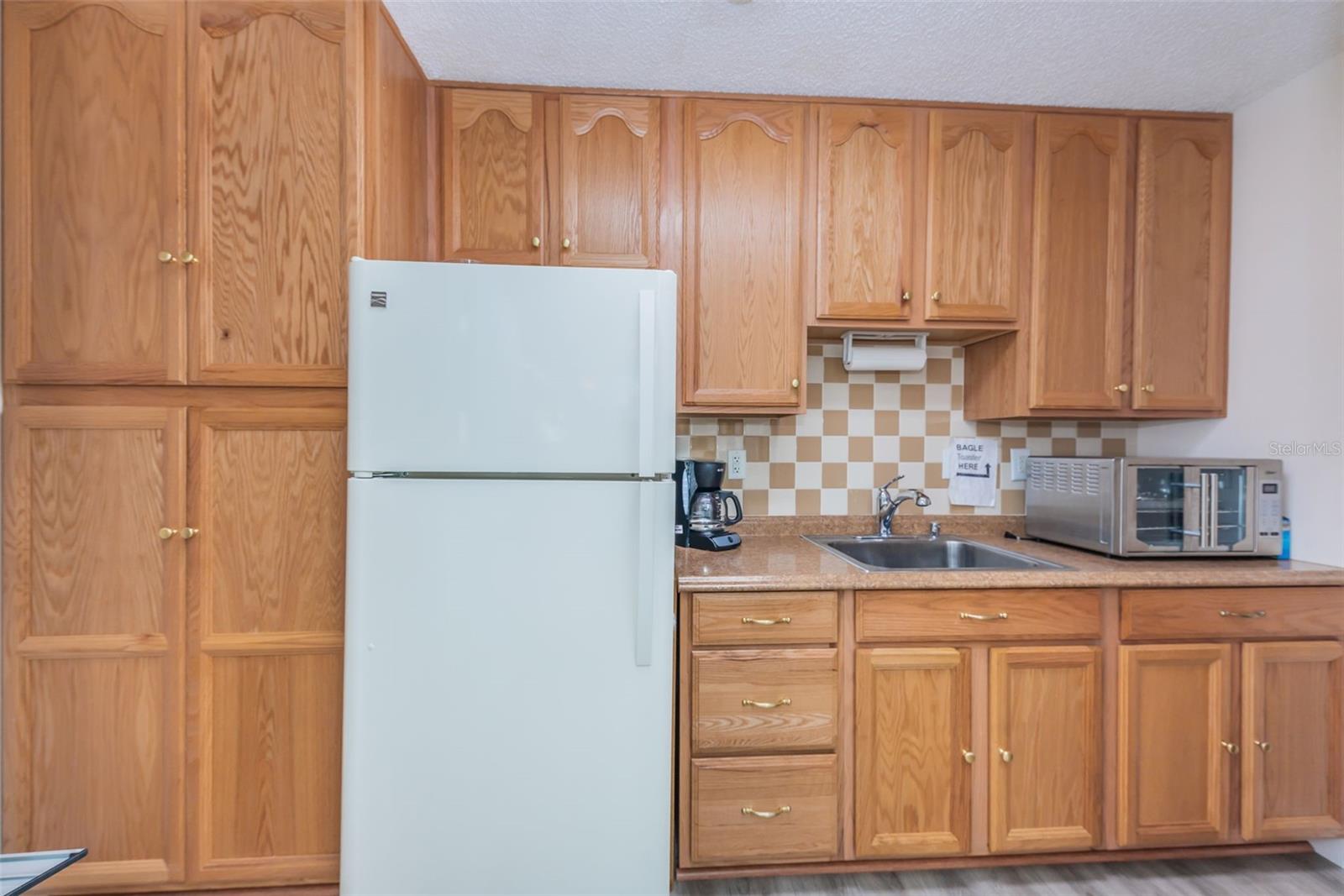 2575 PINE RIDGE WAY S #E1, PALM HARBOR, FL — photo 20