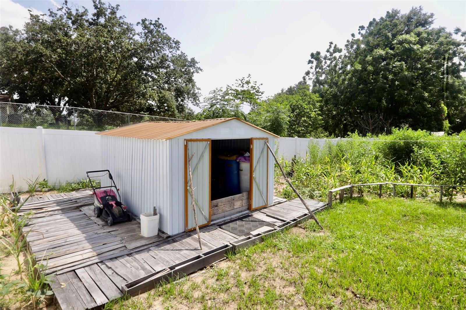 414 W ELLA J GILMORE ST, APOPKA, FL — photo 33