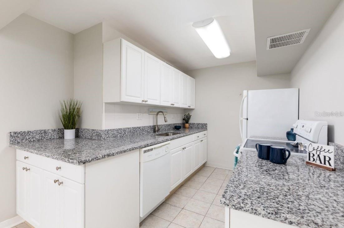 10355 PARADISE BLVD #103, TREASURE ISLAND, FL — photo 12