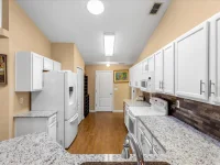 10217 SPRING MOSS AVE — photo 10